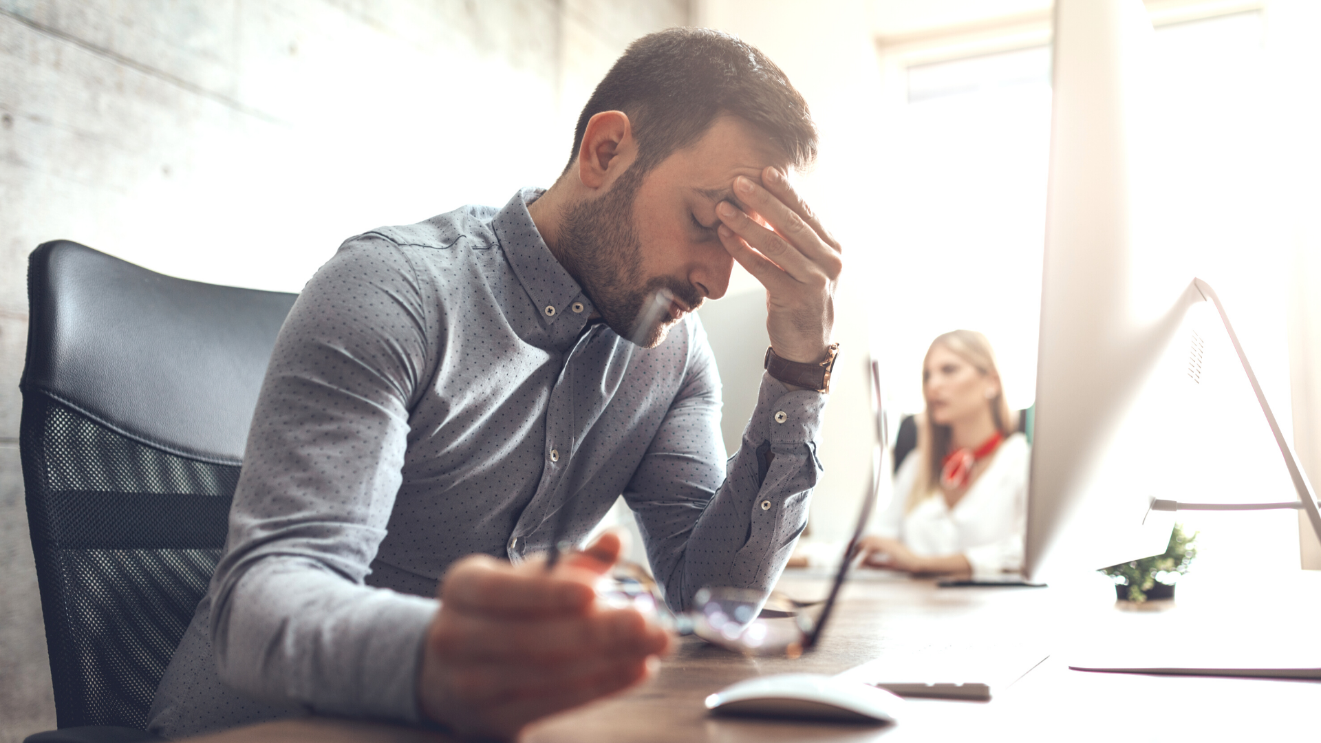 Stressed man at the office